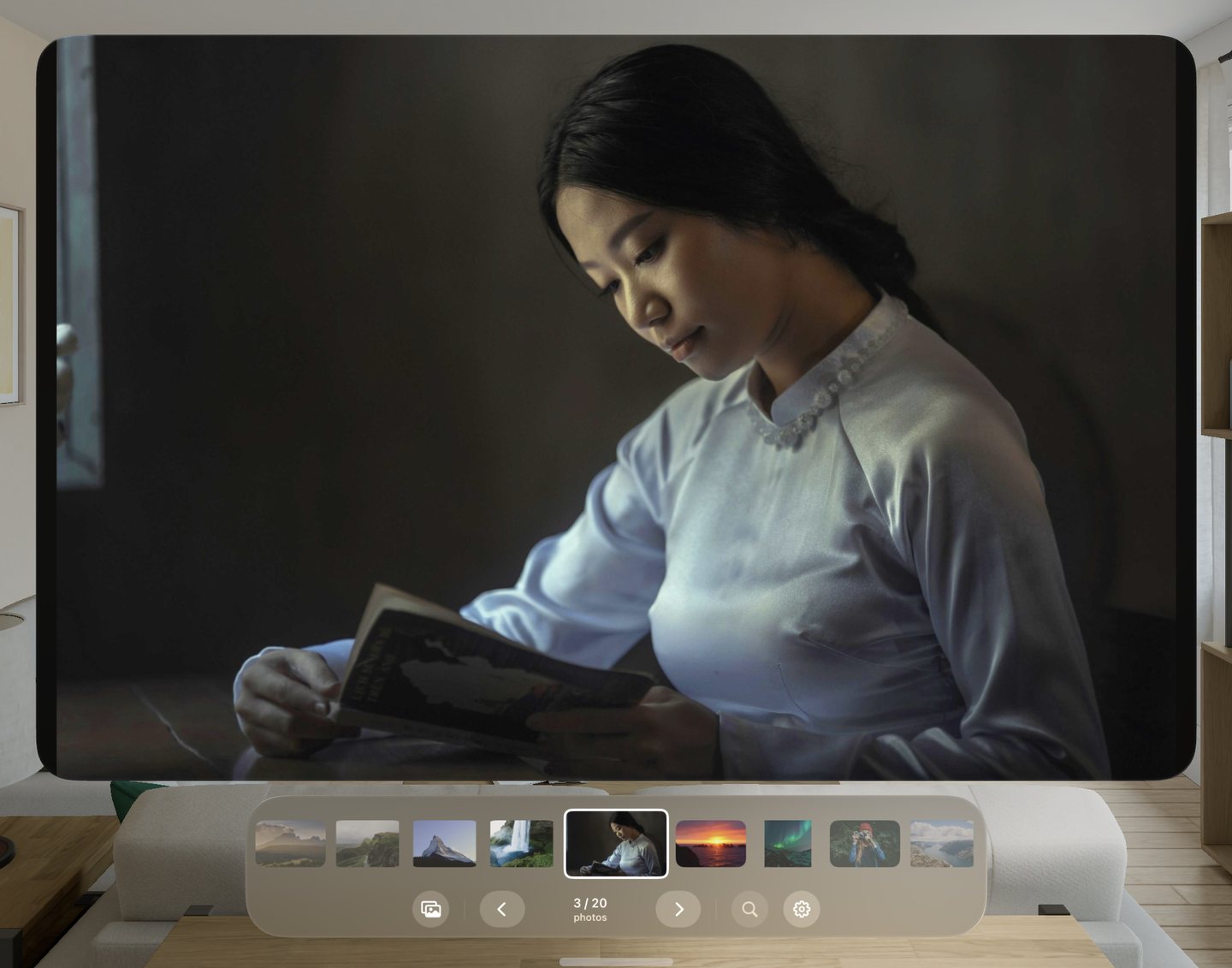 A portrait of a woman reading, filling the window